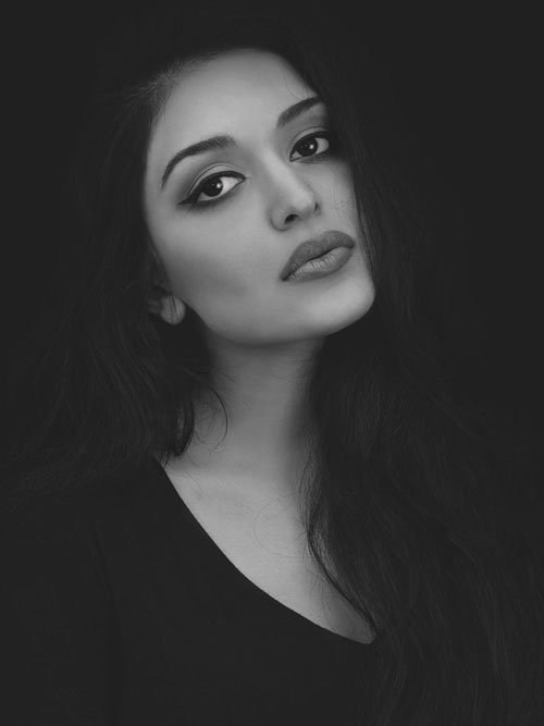 Portrait of a female social media influencer in a black-and-white aesthetic style, representing Influencer Marketing Services in Delhi for brand promotions and digital campaigns.